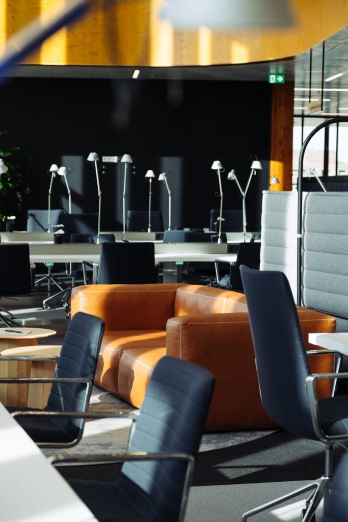 Ergonomic office setup with standing desks and adjustable chairs at EDGE Workspaces.